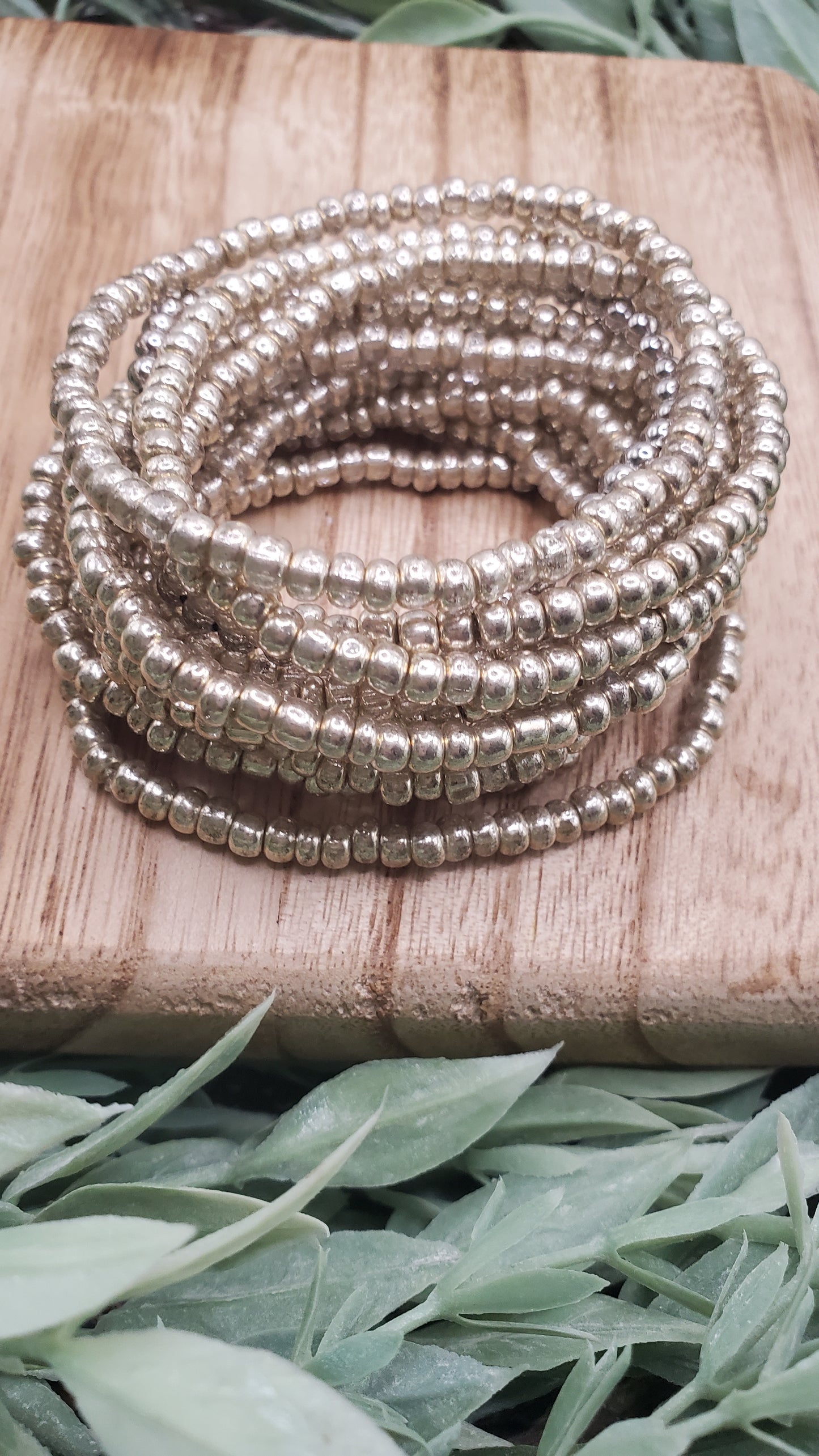 14 silver stone seed beads